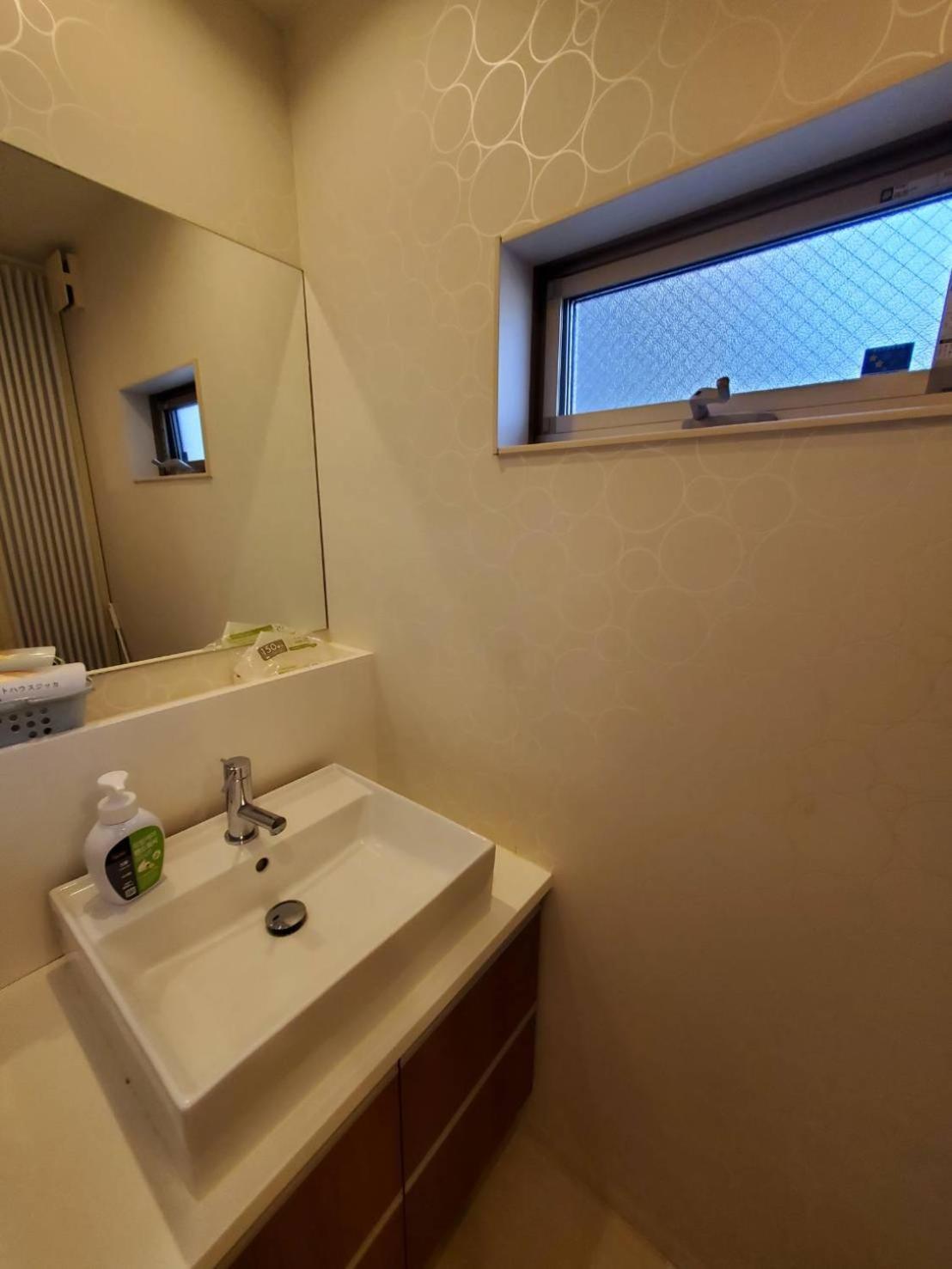 Fukuoka Guest House Jikka Bagian luar foto